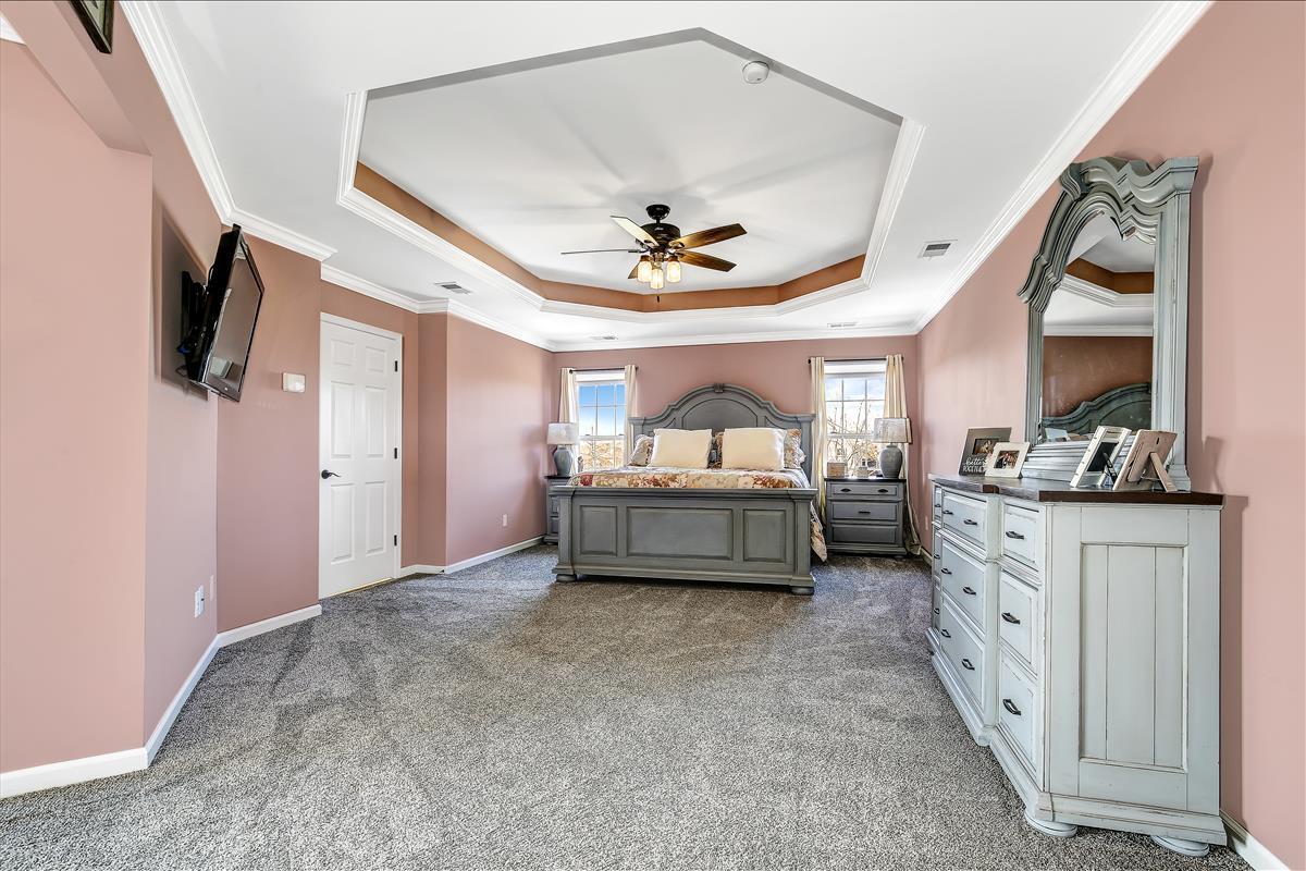5 Jake Drive Cream Ridge, NJ 08514 - Photo 33 of 64 a living room with furniture and a chandelier