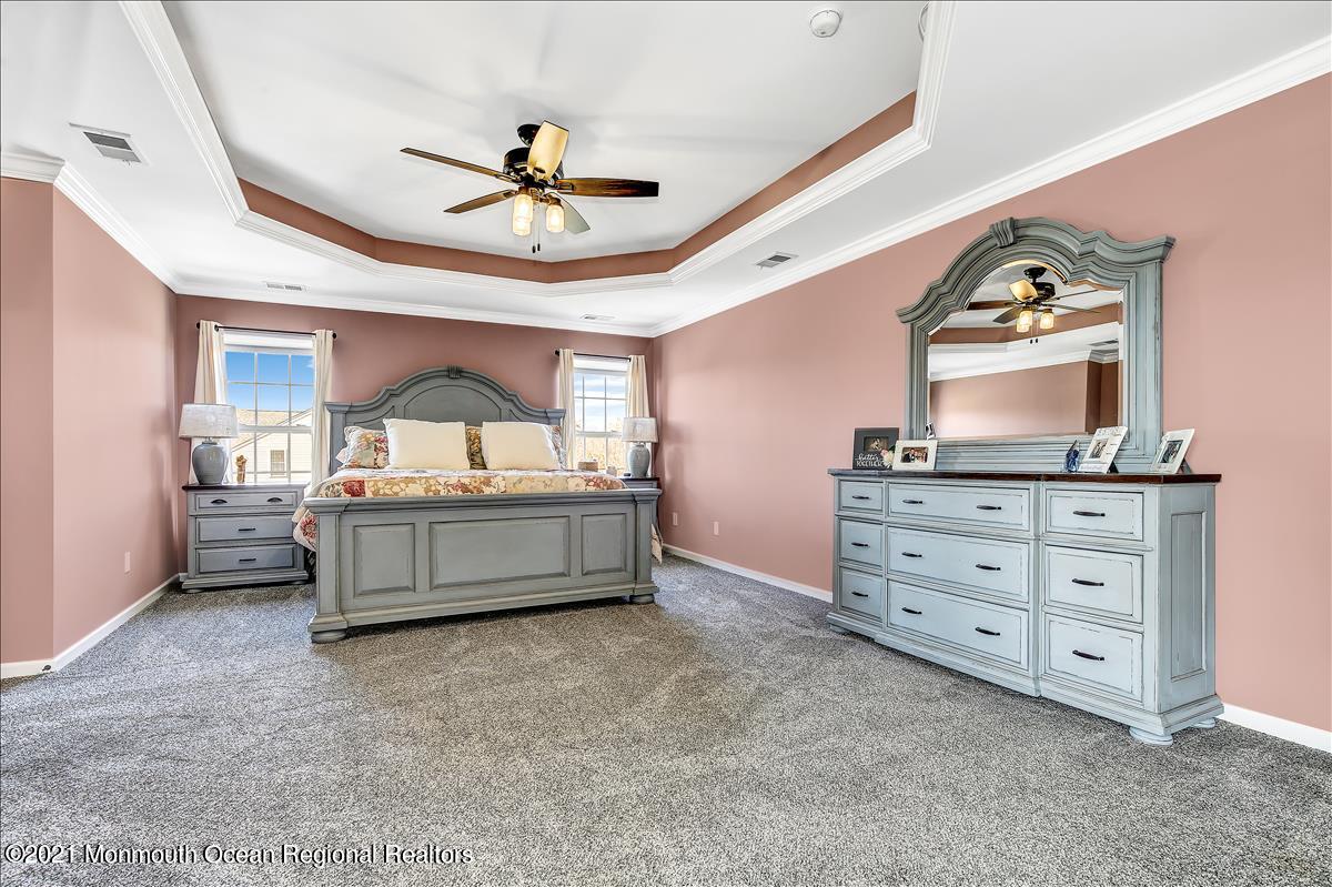 5 Jake Drive Cream Ridge, NJ 08514 - Photo 34 of 64 a living room with furniture and a flat screen tv