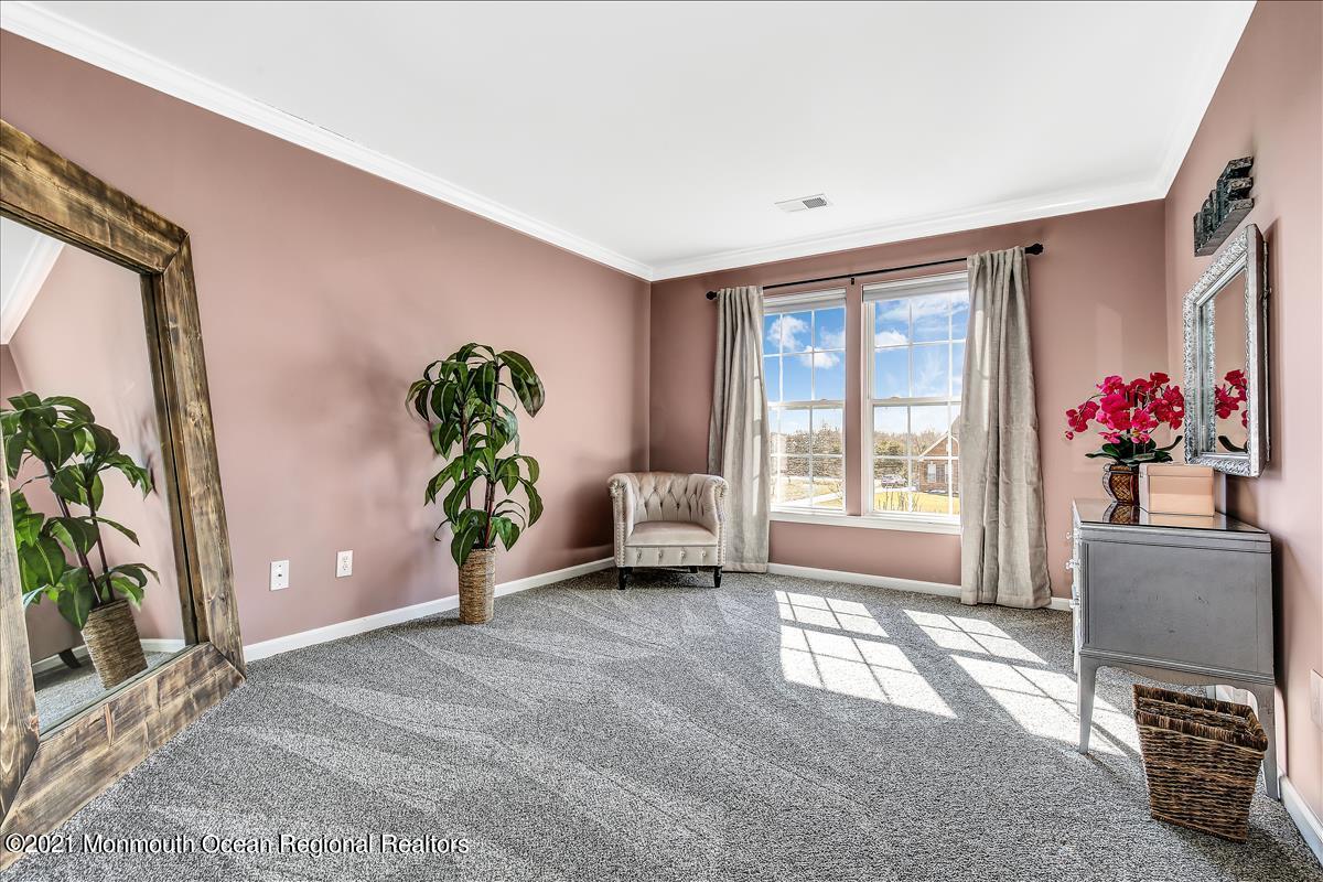 5 Jake Drive Cream Ridge, NJ 08514 - Photo 37 of 64 a living room with furniture and flowers