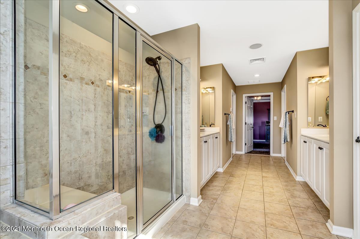 5 Jake Drive Cream Ridge, NJ 08514 - Photo 39 of 64 a bathroom with a glass shower door and a glass door