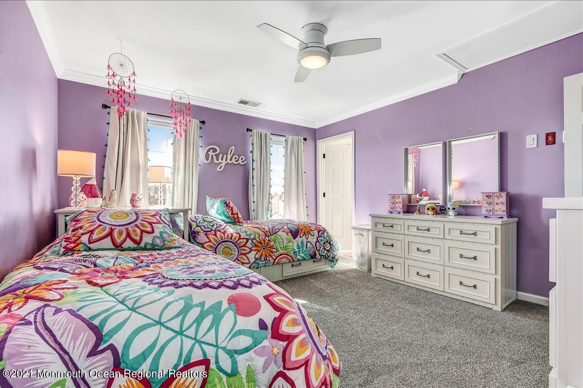 5 Jake Drive Cream Ridge, NJ 08514 - Photo 43 of 64 a bedroom with a bed chandelier and a dresser