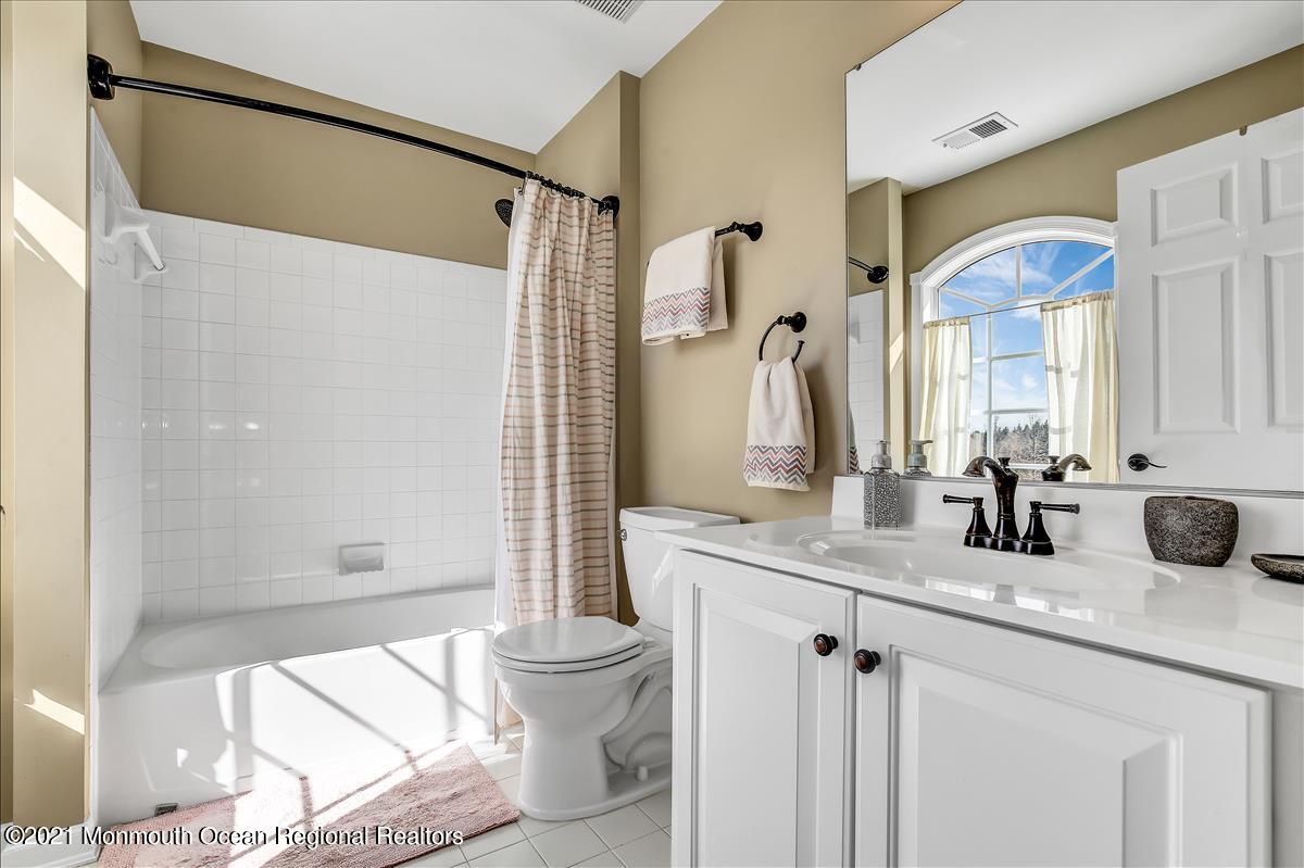 5 Jake Drive Cream Ridge, NJ 08514 - Photo 44 of 64 a bathroom with a granite countertop sink mirror vanity and toilet