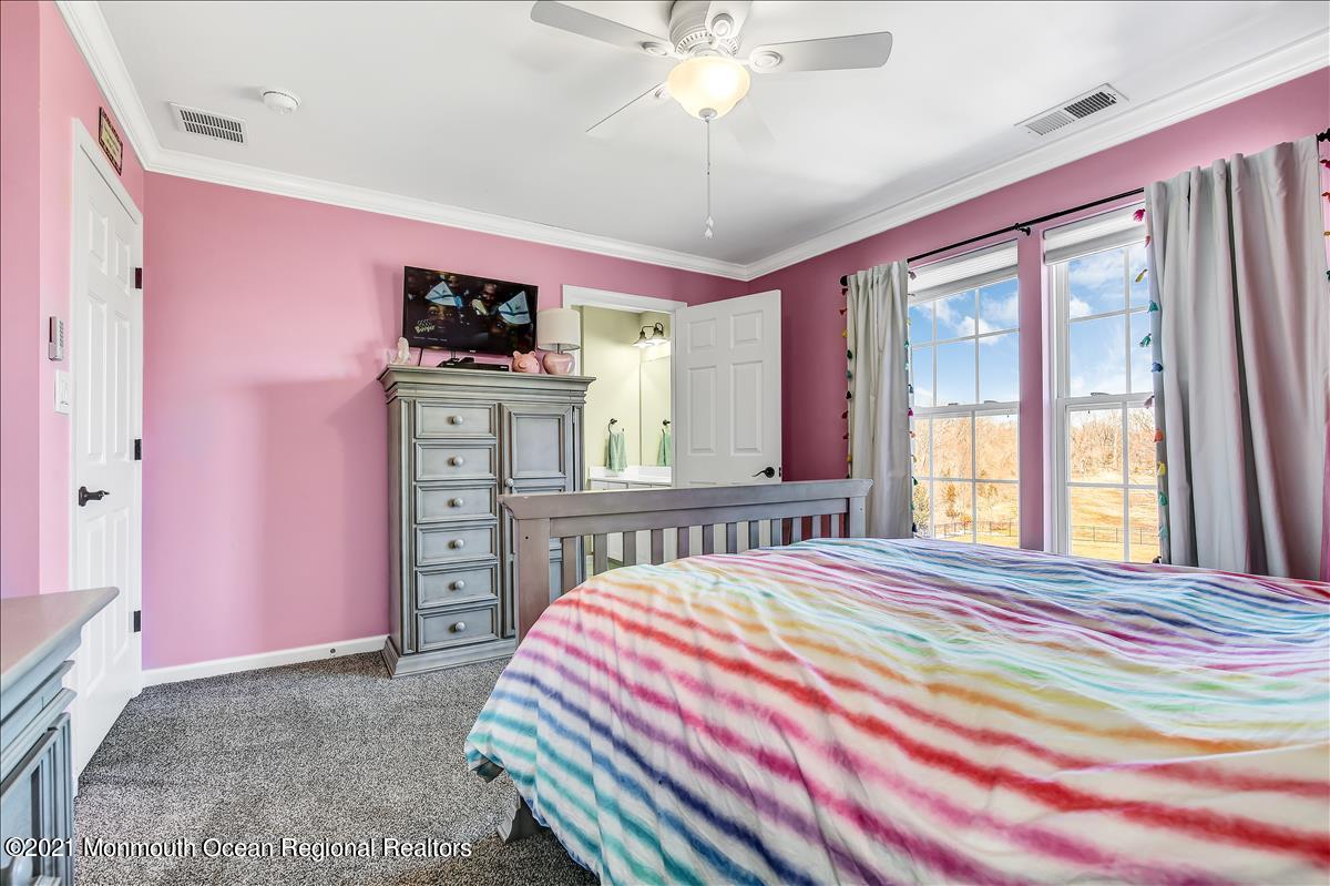 5 Jake Drive Cream Ridge, NJ 08514 - Photo 45 of 64 a bedroom with a bed dresser and a window