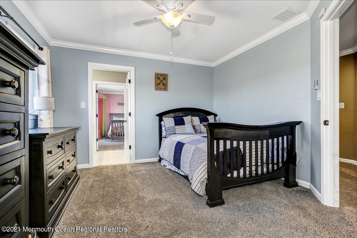 5 Jake Drive Cream Ridge, NJ 08514 - Photo 48 of 64 a bedroom with a bed and a window