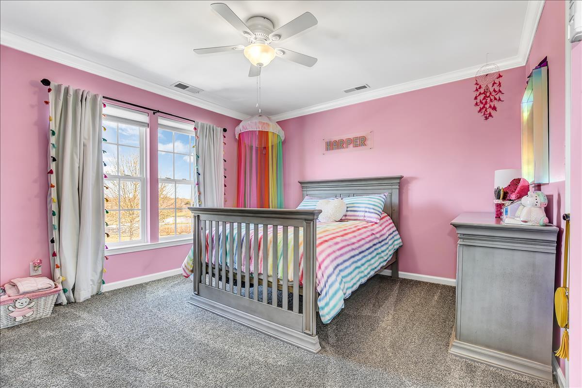 5 Jake Drive Cream Ridge, NJ 08514 - Photo 50 of 64 a bedroom with a bed and a chandelier