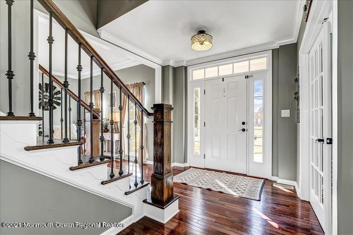 5 Jake Drive Cream Ridge, NJ 08514 - Photo 6 of 64 a view of front door with hallway and wooden floor