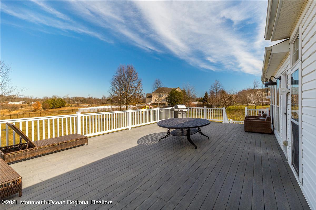 5 Jake Drive Cream Ridge, NJ 08514 - Photo 59 of 64 a view of a terrace with wooden benches