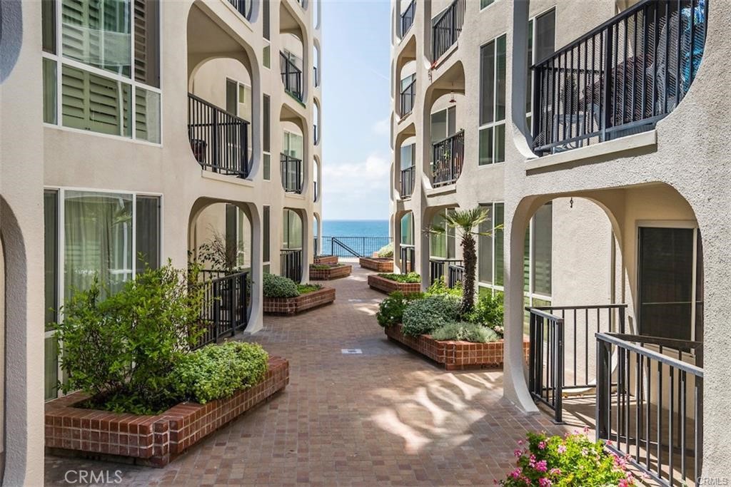 565 Esplanade, Unit 308 Redondo Beach, CA 90277 - Photo 22 of 28 a view of a building with potted plants