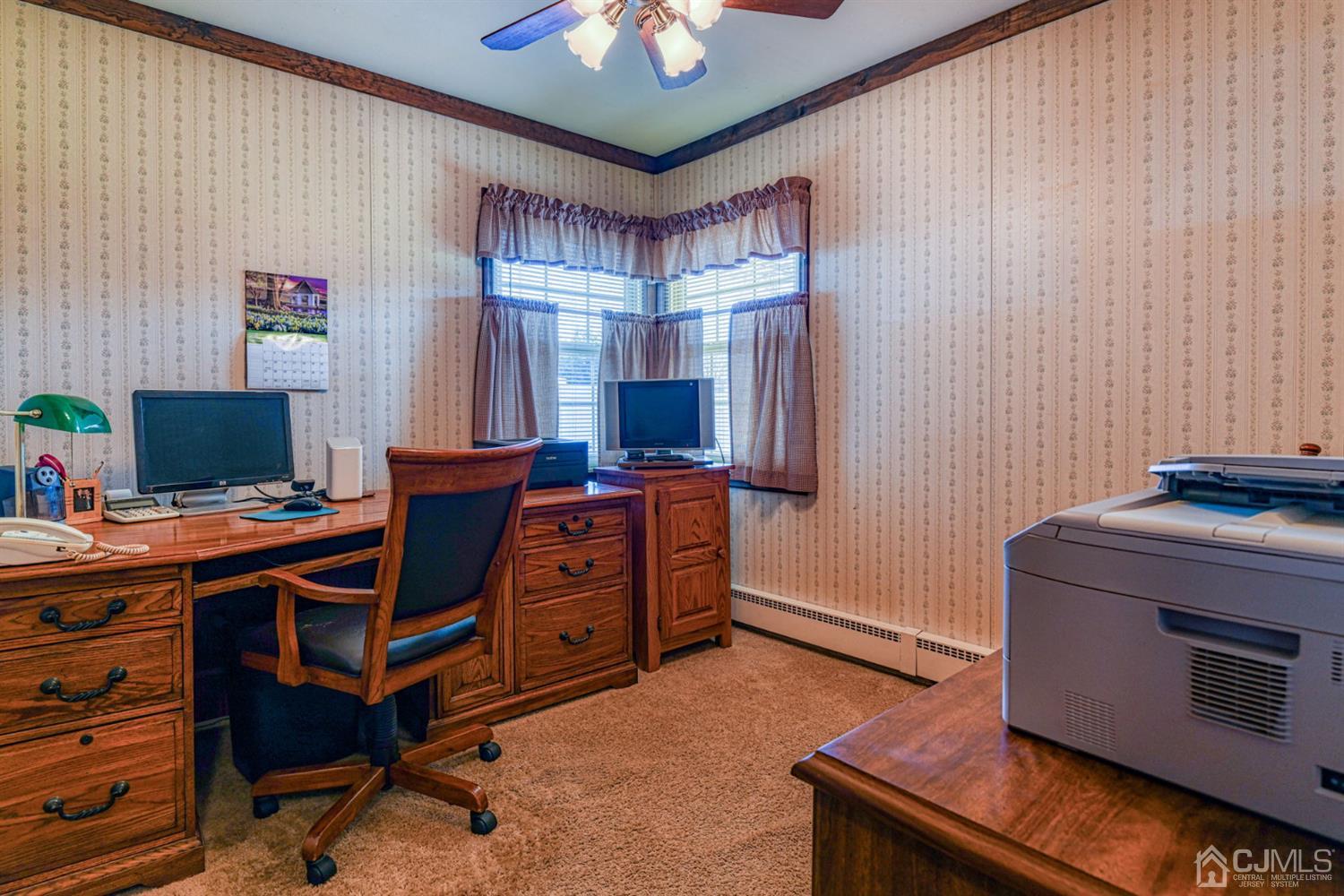 154 East Hill Road Colonia, NJ 07067 - Photo 17 of 25 a view of a workspace with furniture and a window