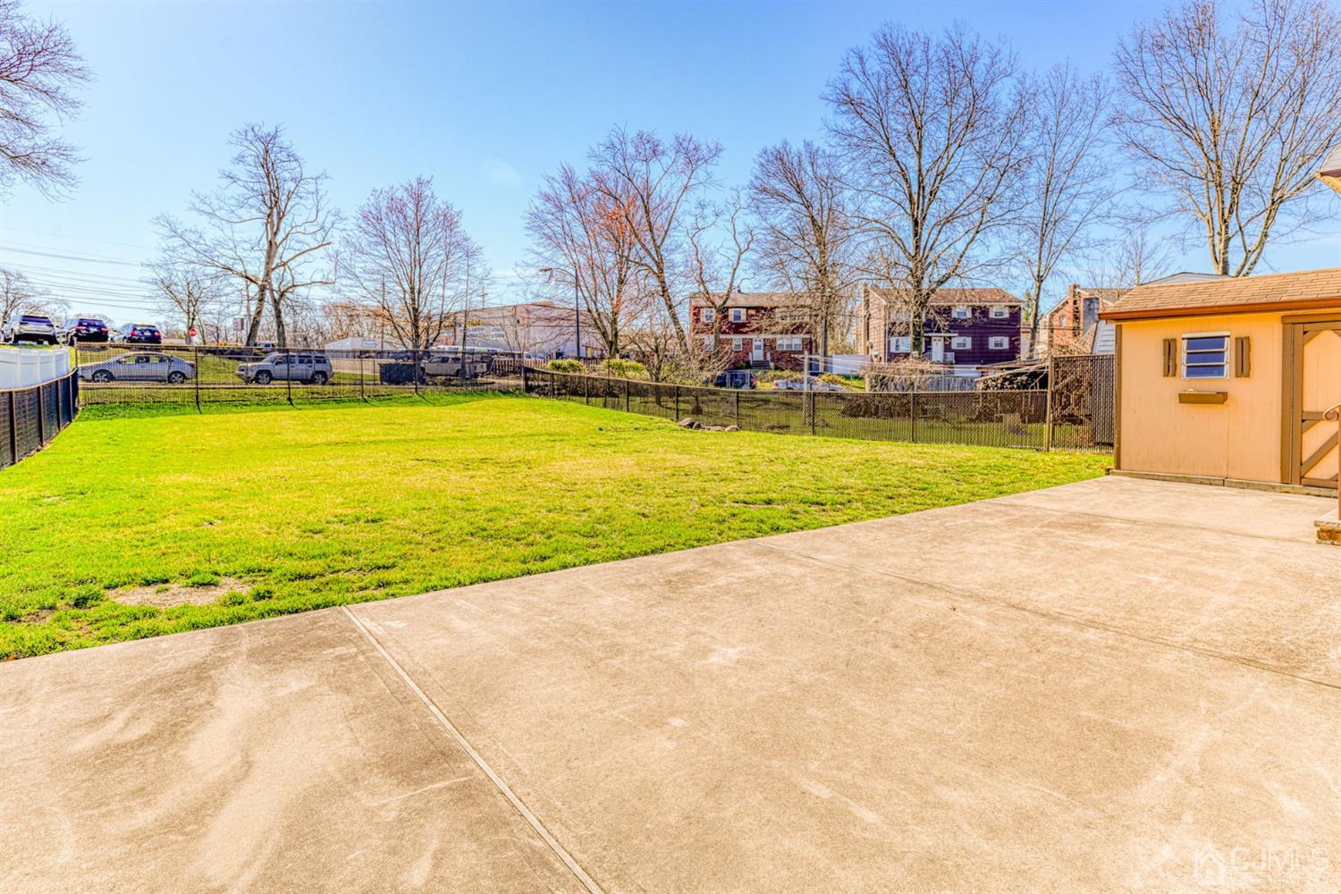154 East Hill Road Colonia, NJ 07067 - Photo 25 of 25 a view of swimming pool with outdoor seating and a garden
