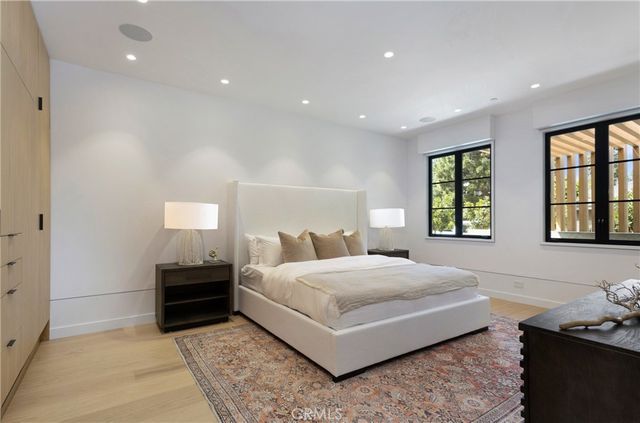 a living room with furniture a potted plant and a potted plant