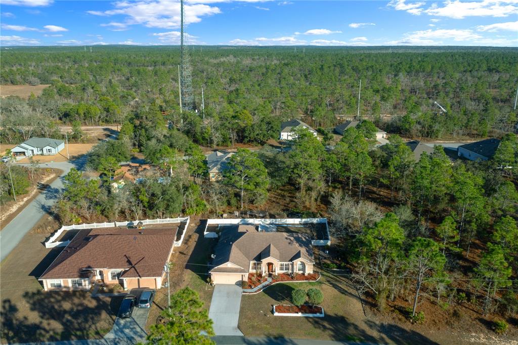 27 Vinca Street Homosassa, FL 34446 - Photo 13 of 50 an aerial view of a house with a yard