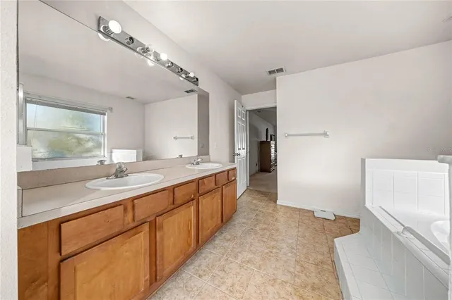 a view of kitchen and wooden floor