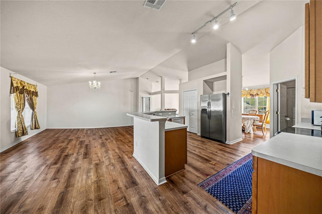 27 Vinca Street Homosassa, FL 34446 - Photo 37 of 50 a kitchen with stainless steel appliances granite countertop a refrigerator and a sink
