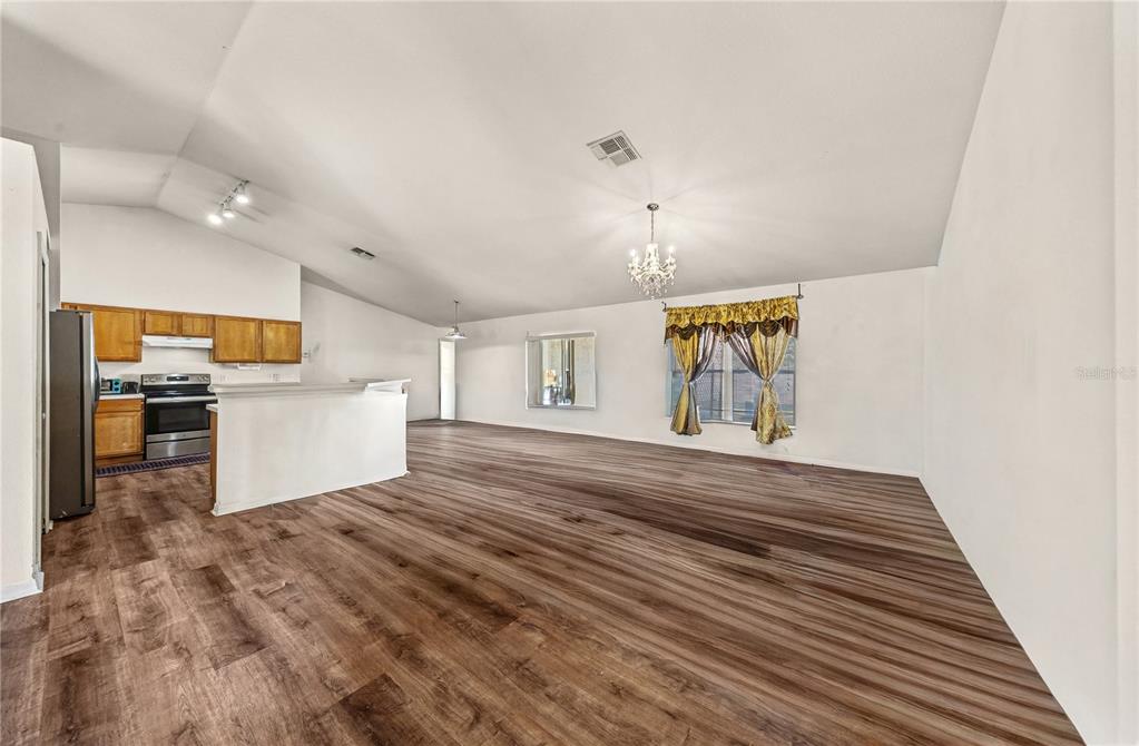 27 Vinca Street Homosassa, FL 34446 - Photo 38 of 50 a view of a hallway with wooden floor