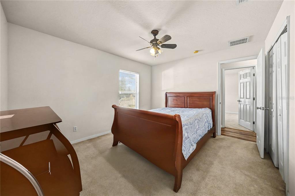 27 Vinca Street Homosassa, FL 34446 - Photo 46 of 50 a bedroom with a bed and a window