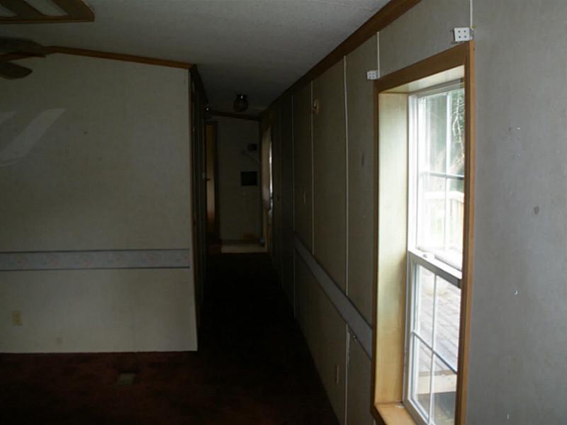 327 Howland Road Lagrange, ME 04453 - Photo 11 of 26 Living Room.