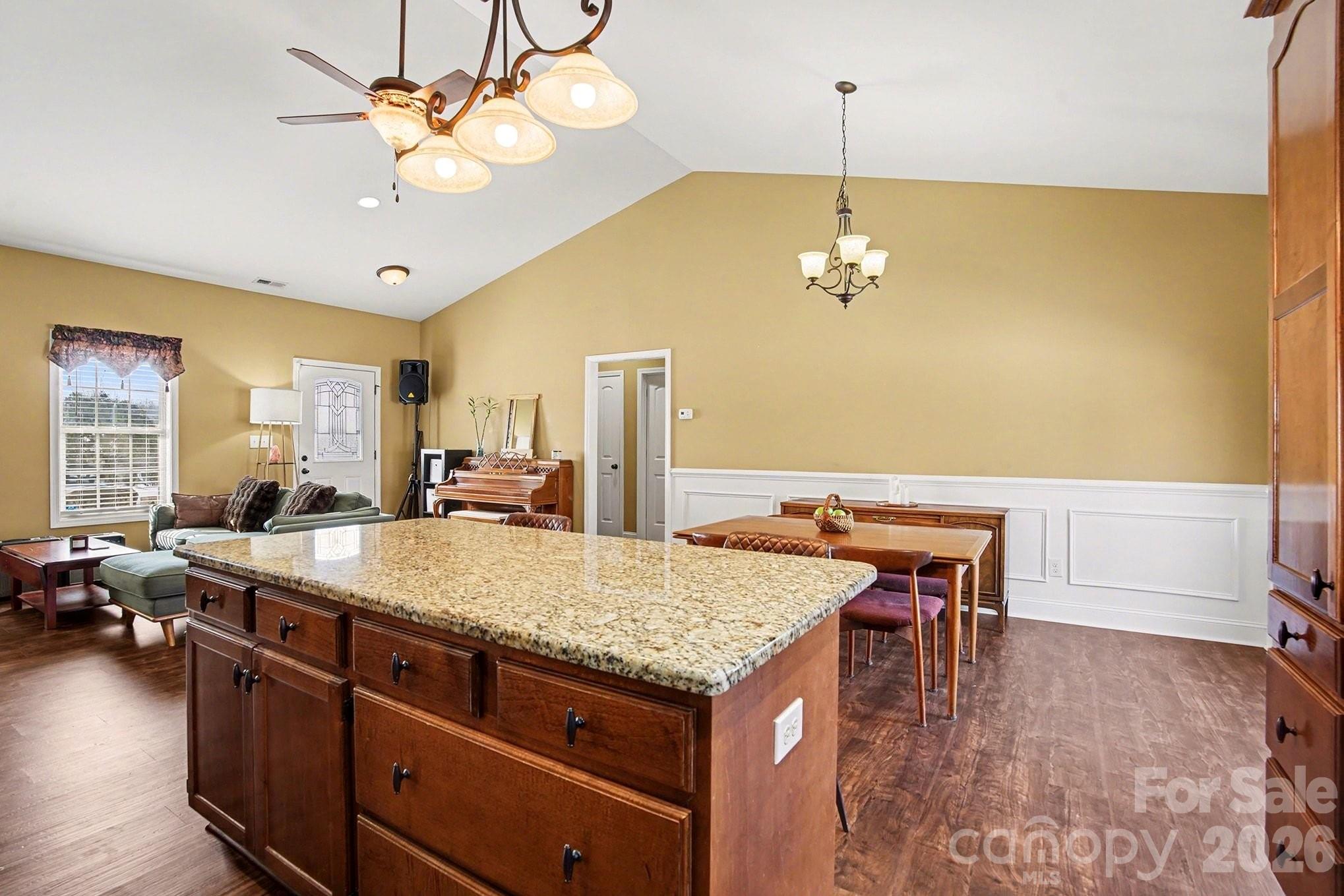 311 Massey Deal Road Statesville, NC 28625 - Photo 11 of 34 a room with a table and chairs