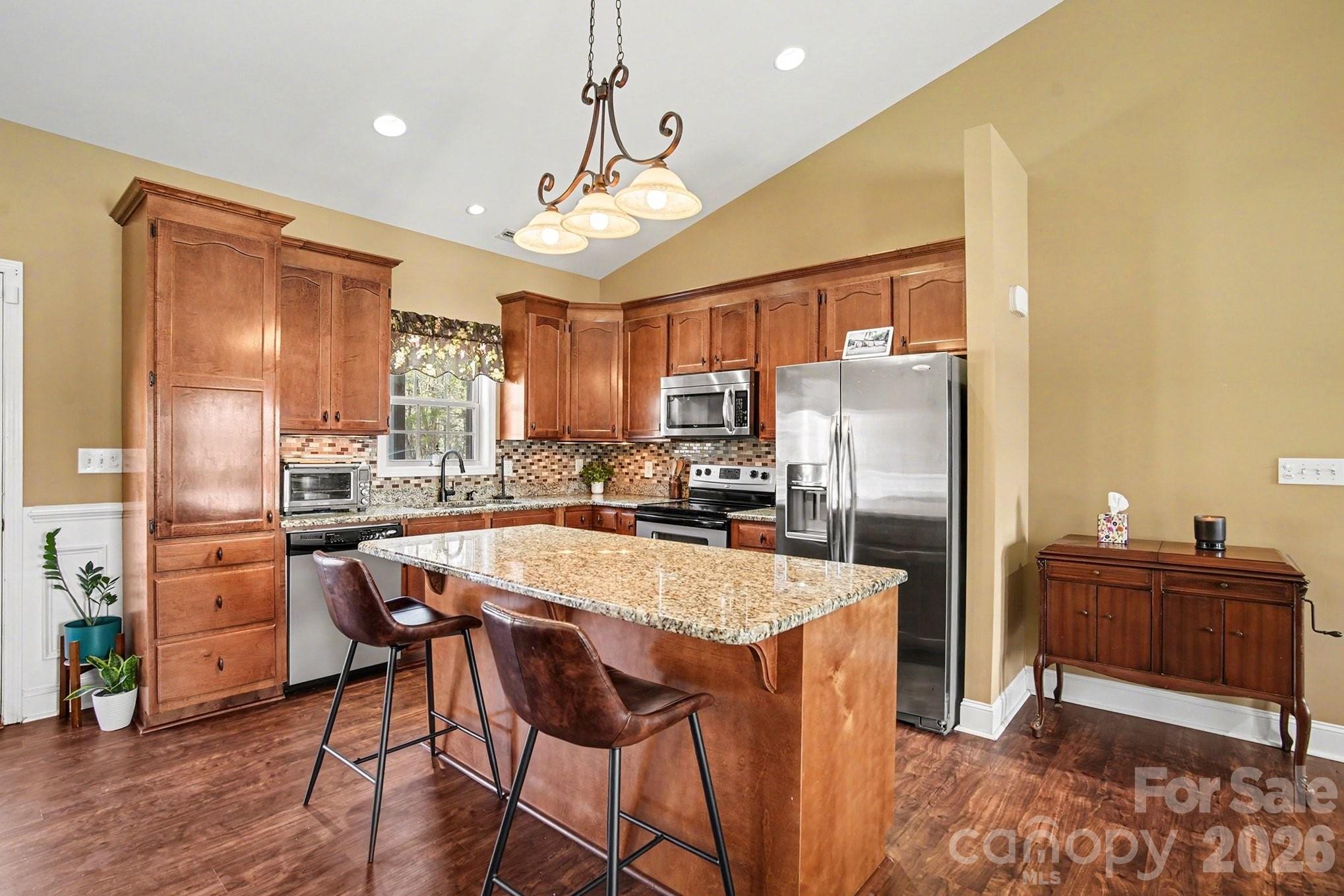 311 Massey Deal Road Statesville, NC 28625 - Photo 12 of 34 a large kitchen with a table and chairs