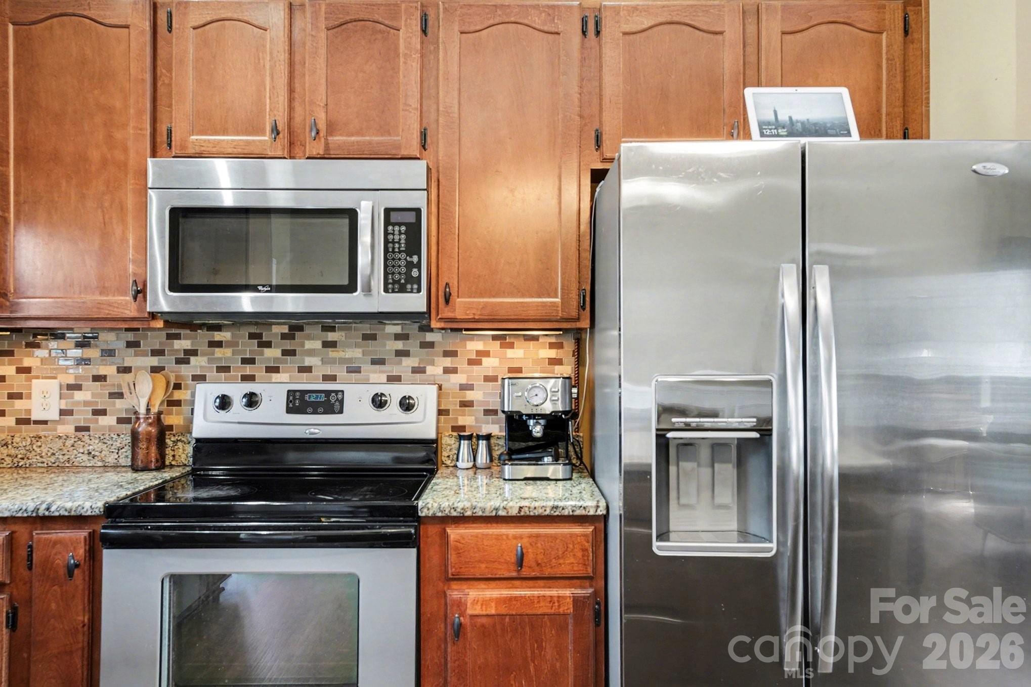 311 Massey Deal Road Statesville, NC 28625 - Photo 15 of 34 a stove top oven sitting inside of a kitchen