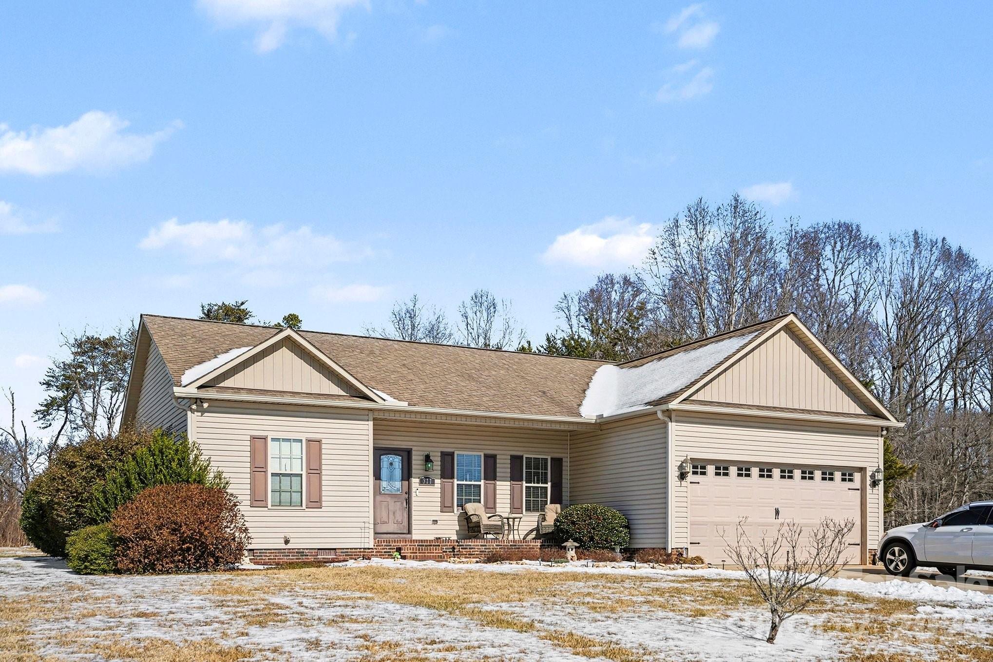 311 Massey Deal Road Statesville, NC 28625 - Photo 2 of 34 a front view of a house with a yard