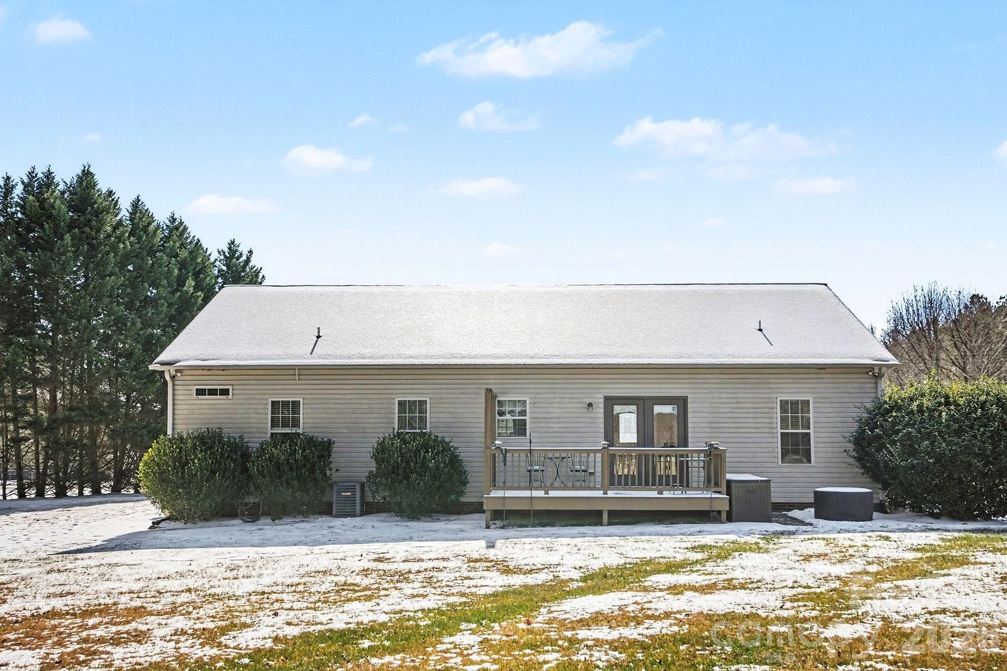 311 Massey Deal Road Statesville, NC 28625 - Photo 31 of 34 a front view of a house with a yard