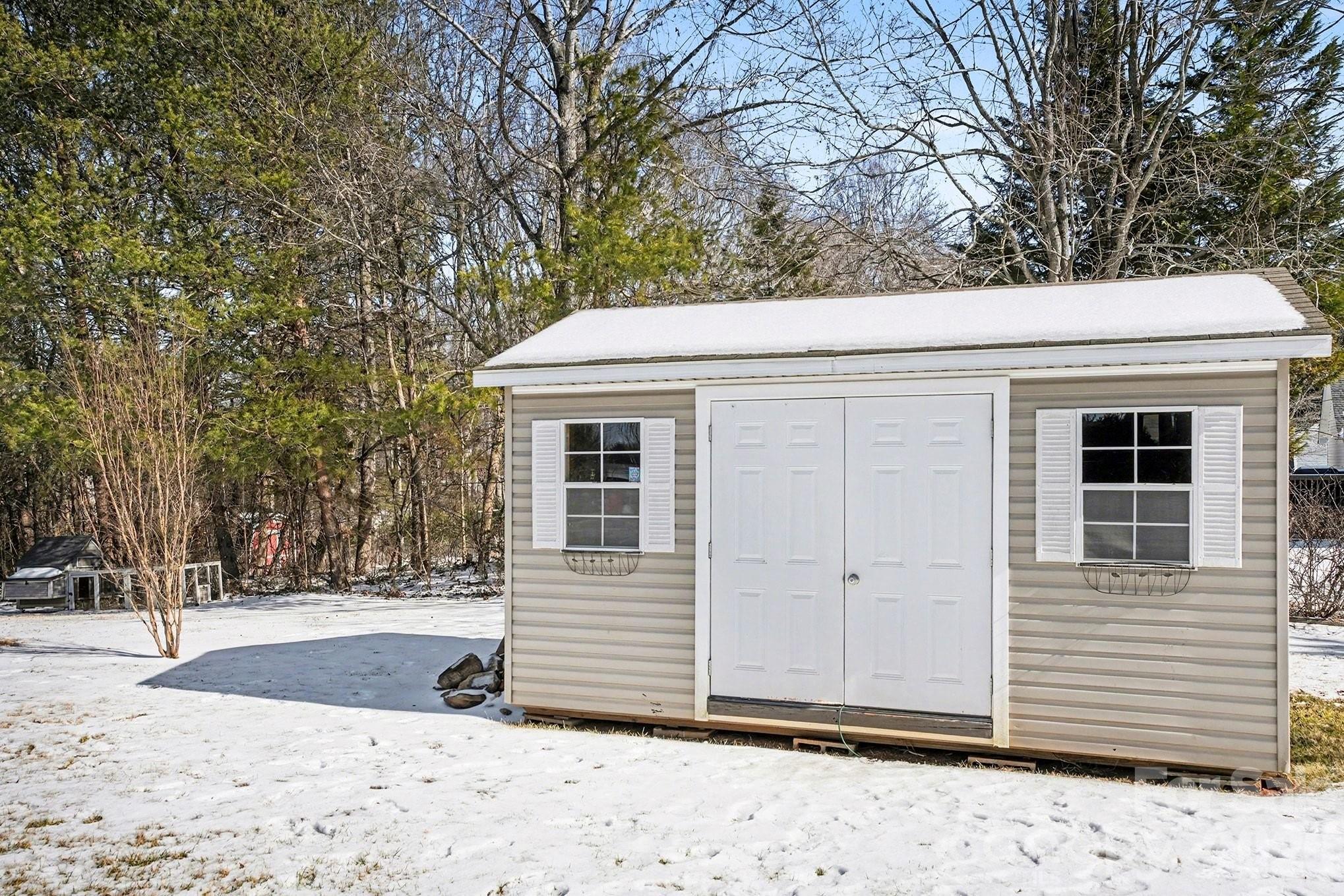 311 Massey Deal Road Statesville, NC 28625 - Photo 33 of 34 a view of house with a tree in the background
