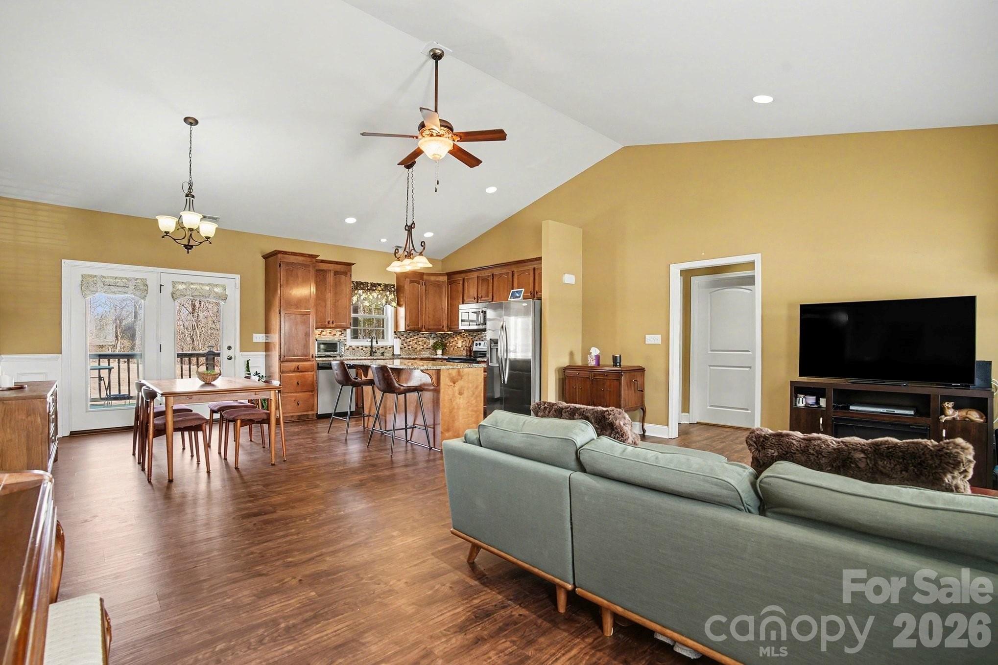 311 Massey Deal Road Statesville, NC 28625 - Photo 6 of 34 a living room with furniture and a flat screen tv