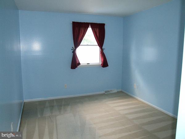 3236 Roxbury Road Hatfield, PA 19440 - Photo 17 of 38 Bright blue walls invite creativity.