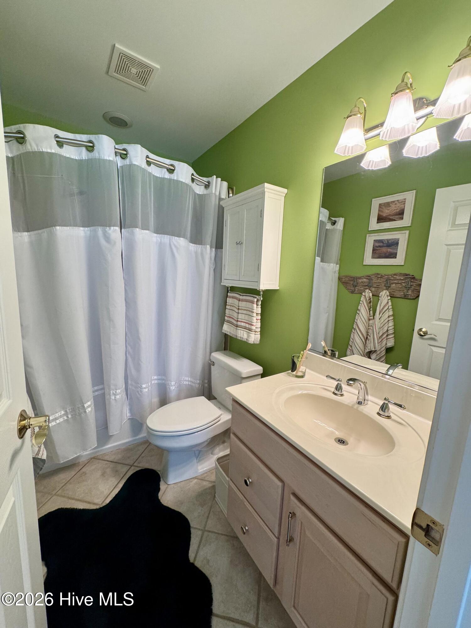 573 Coral Ridge Road Pine Knoll Shores, NC 28512 - Photo 17 of 32 17_beyc69c67a09ac31d