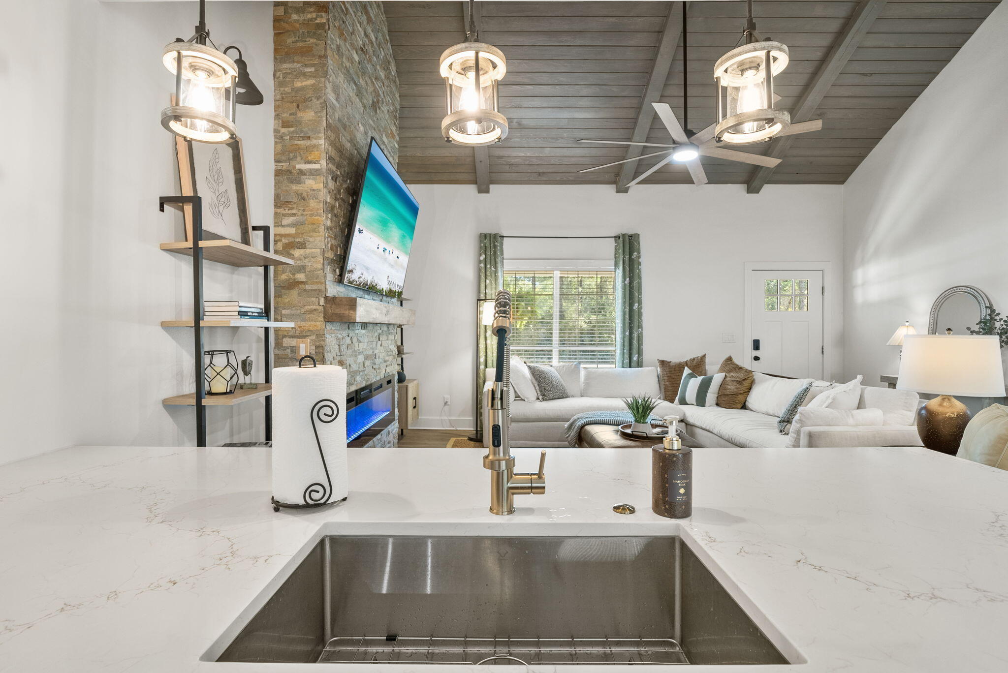 1045 Don Bishop Road Santa Rosa Beach, FL 32459 - Photo 17 of 37 a view of living room with furniture and chandelier