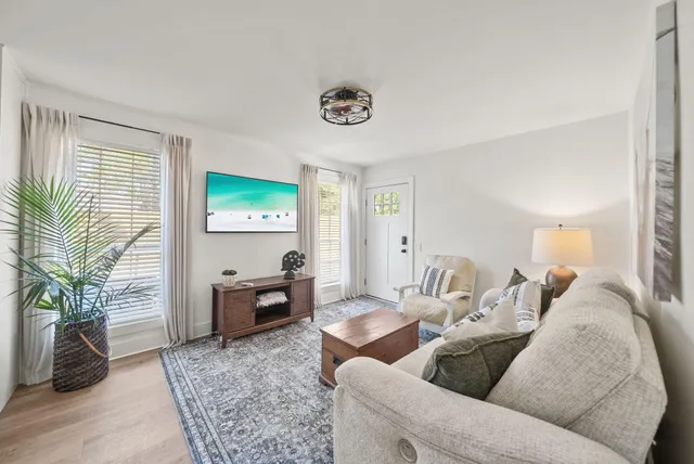 a living room with furniture and a couch