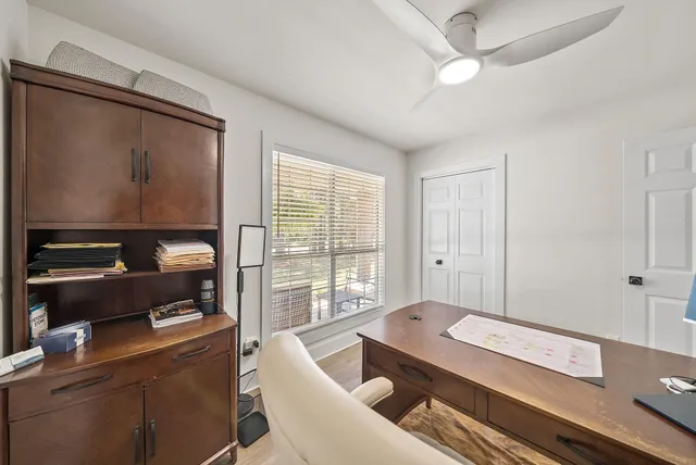 a living room with a couch and a window