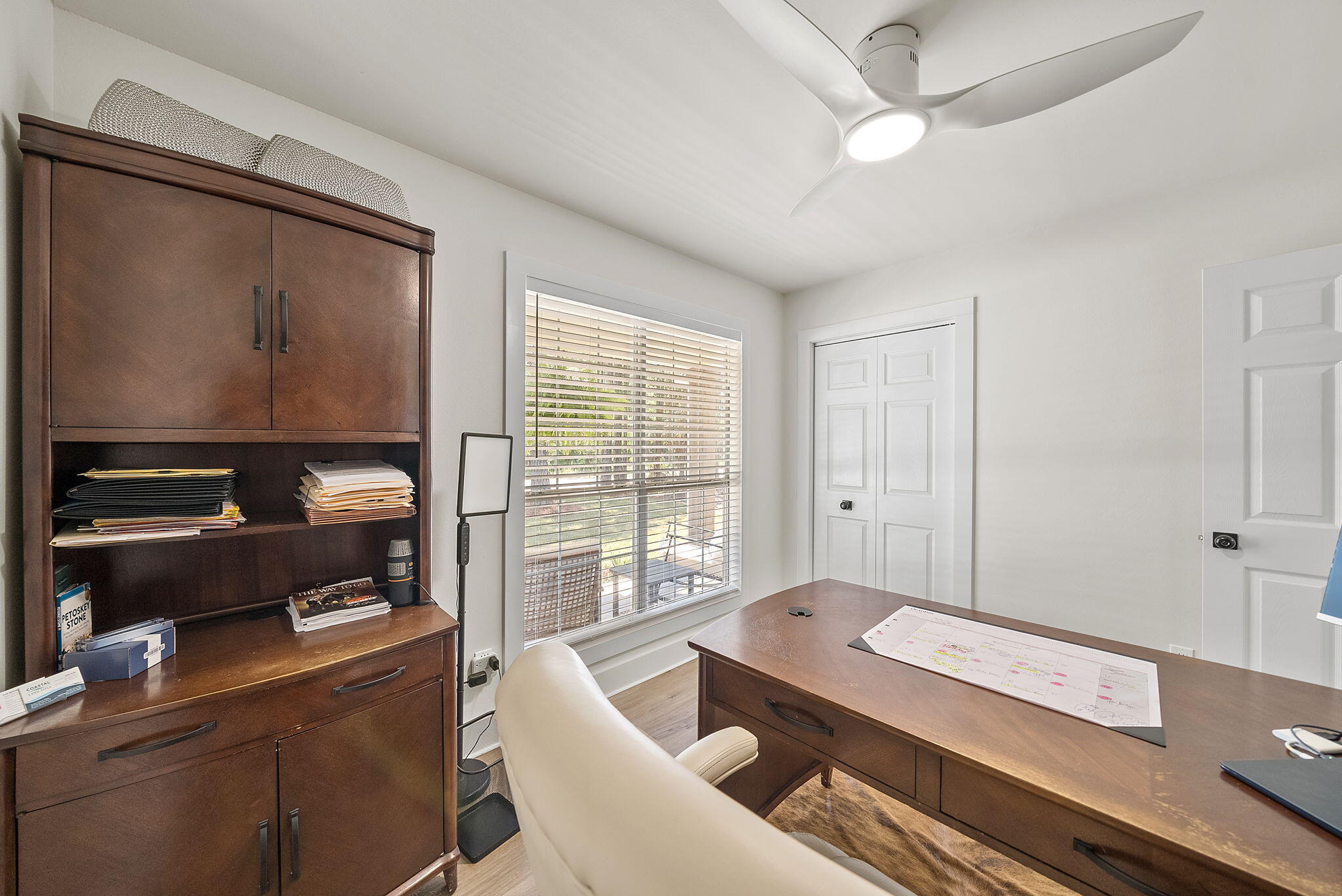 1045 Don Bishop Road Santa Rosa Beach, FL 32459 - Photo 27 of 37 a living room with a couch and a window