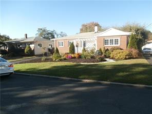 24 Anita Road Bronxville, NY 10708 - Photo 1 of 1 a front view of a house with a garden and yard