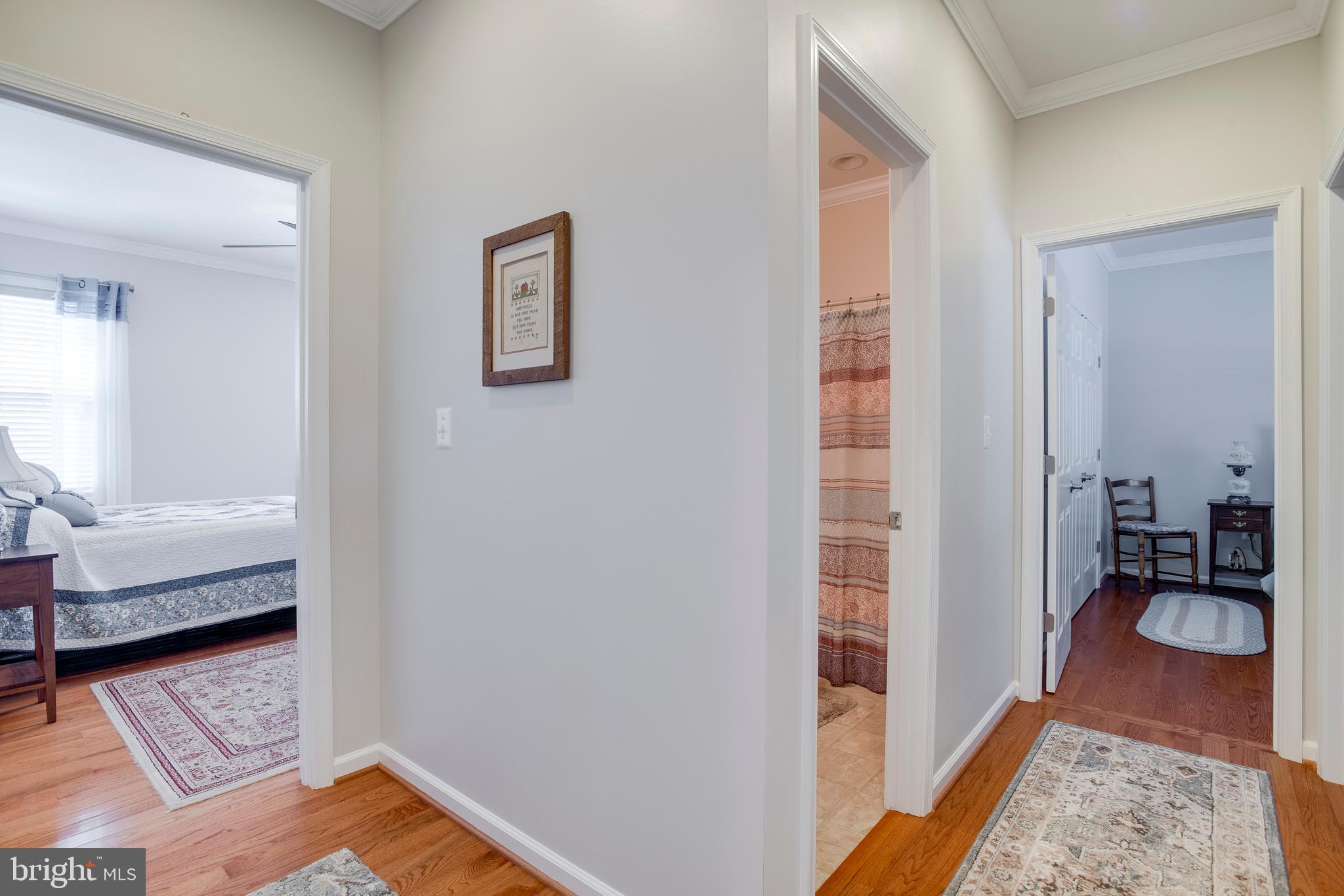 9408 Blackbird Loop Culpeper, VA 22701 - Photo 29 of 89 a view of a bedroom with wooden floor and bedroom