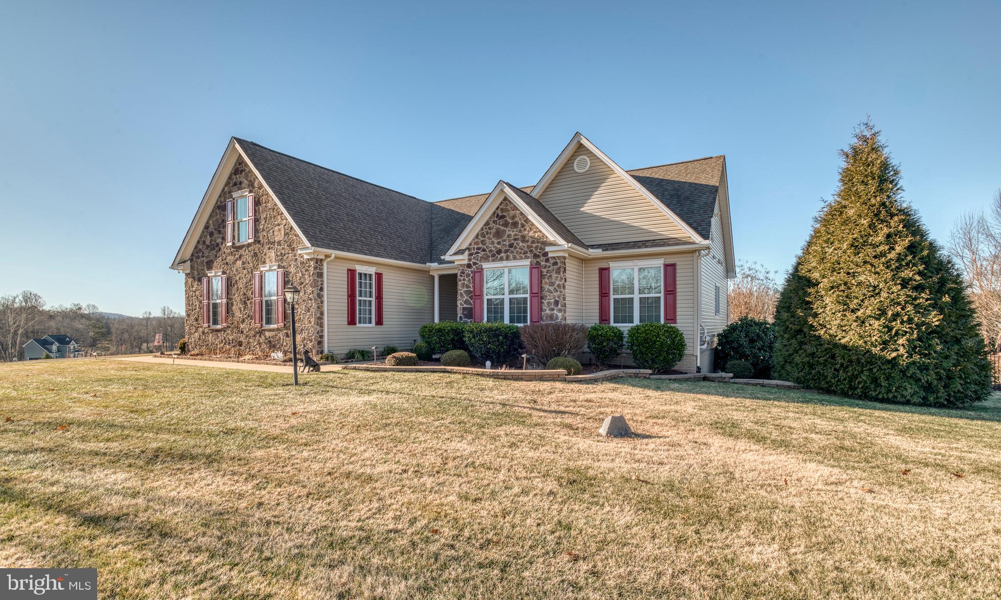 9408 Blackbird Loop Culpeper, VA 22701 - Photo 46 of 89 a front view of a house with a yard