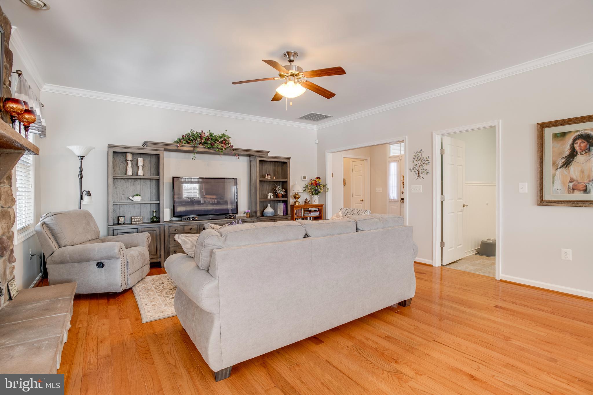9408 Blackbird Loop Culpeper, VA 22701 - Photo 6 of 89 a living room with furniture and a flat screen tv