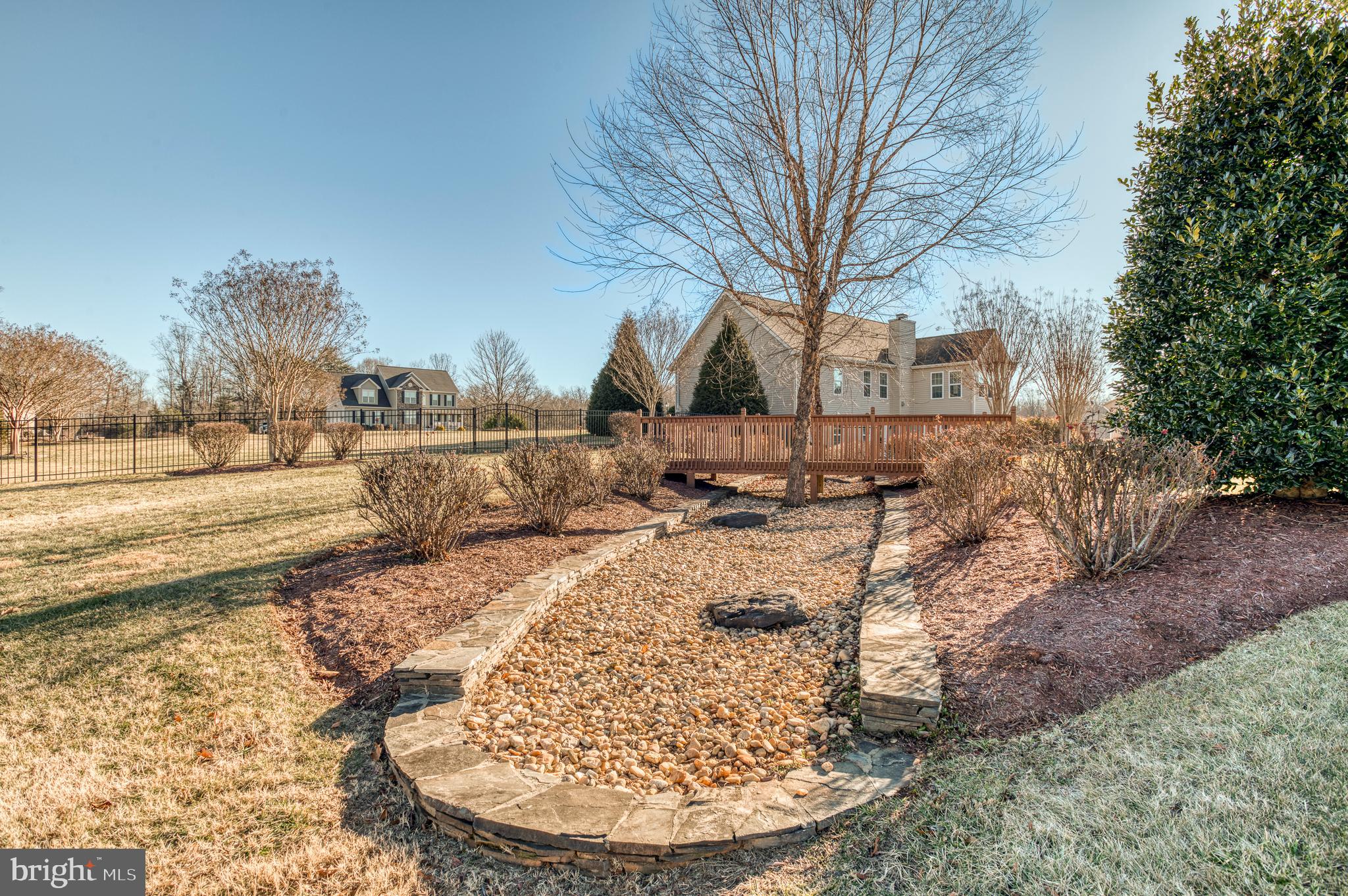 9408 Blackbird Loop Culpeper, VA 22701 - Photo 61 of 89 a view of a yard with a house