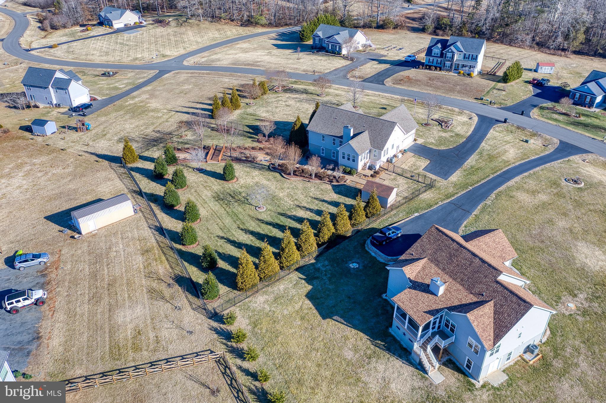 9408 Blackbird Loop Culpeper, VA 22701 - Photo 74 of 89 an aerial view of a house with a yard