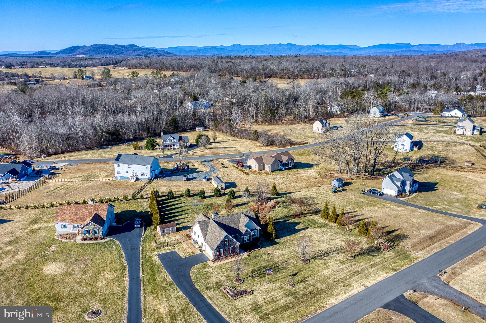 9408 Blackbird Loop Culpeper, VA 22701 - Photo 84 of 89 a view of a swimming pool with a mountain view