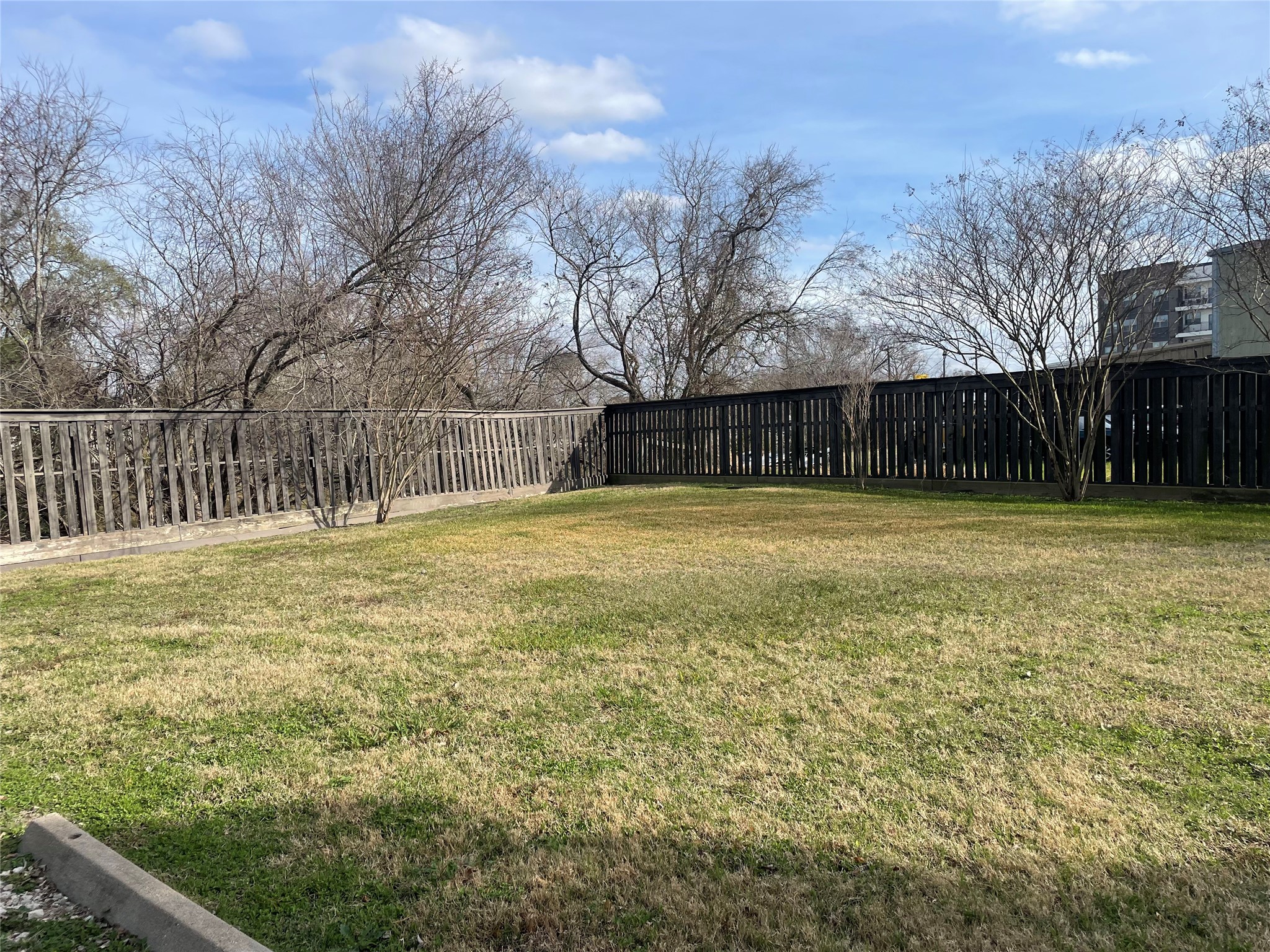 434 Lenard Street, Unit F Houston, TX 77009 - Photo 12 of 15 a view of a yard with a house