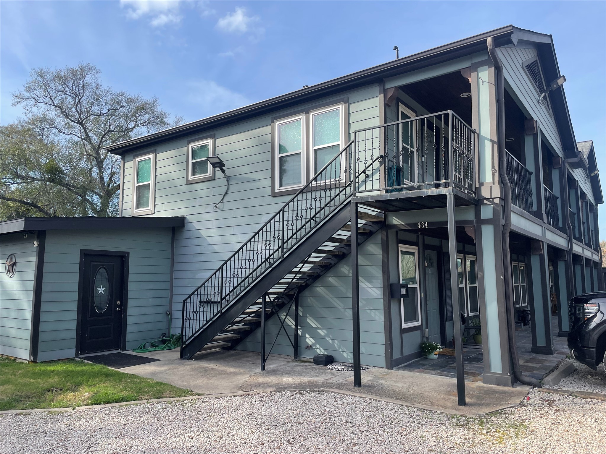 434 Lenard Street, Unit F Houston, TX 77009 - Photo 13 of 15 a front view of a house with a yard