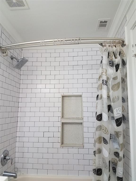 434 Lenard Street, Unit F Houston, TX 77009 - Photo 6 of 15 a bathroom with a shower