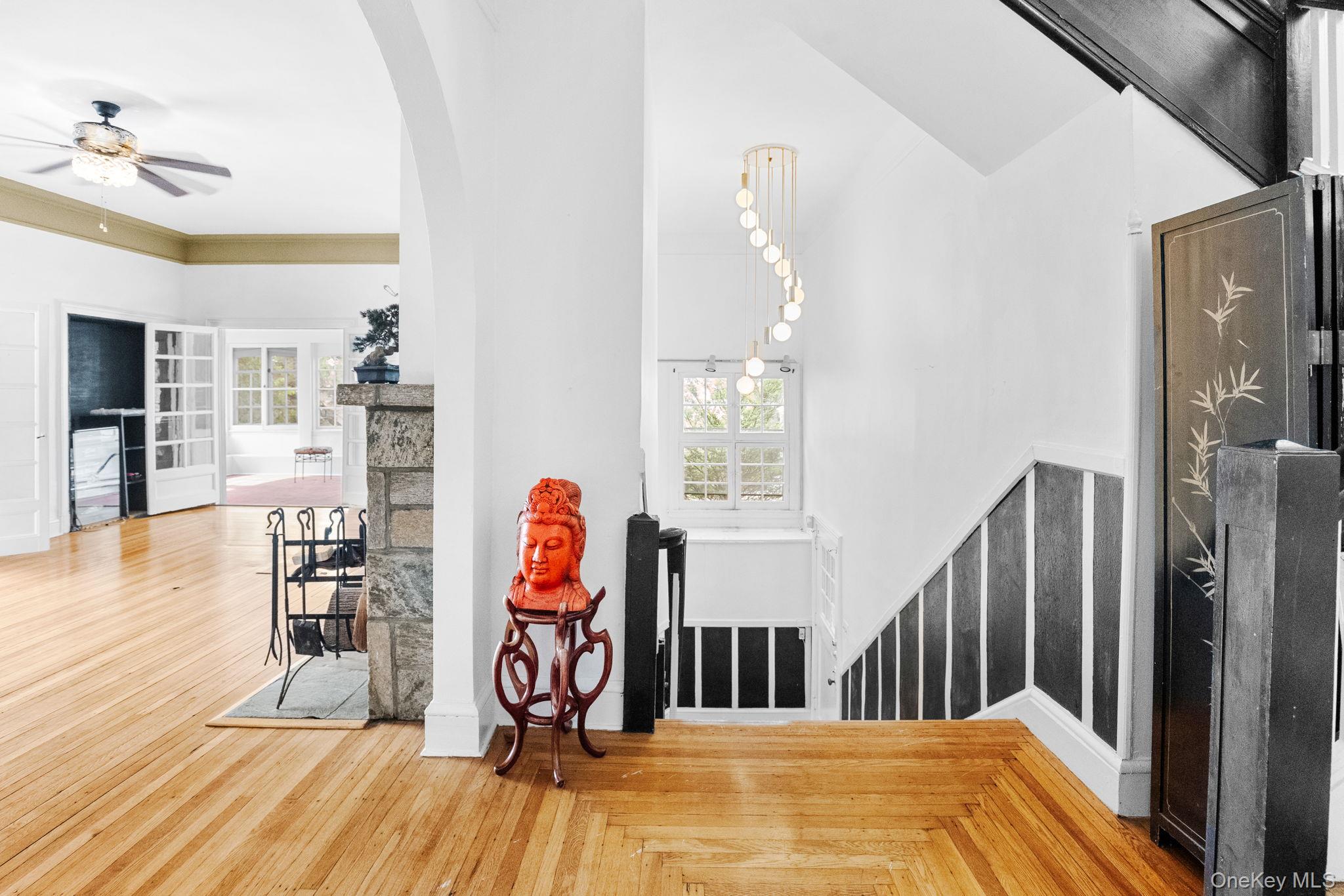 72 Hamilton Avenue New Rochelle, NY 10801 - Photo 4 of 28 a view of a gallery with wooden floor