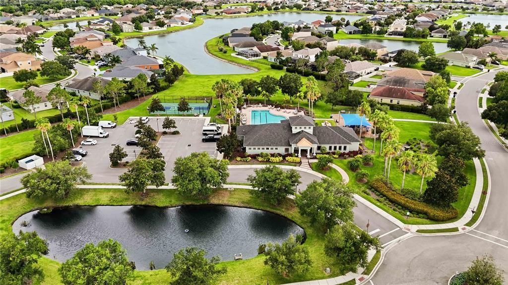 10920 79th Street East Parrish, FL 34219 - Photo 72 of 73 an aerial view of residential houses with outdoor space and swimming pool