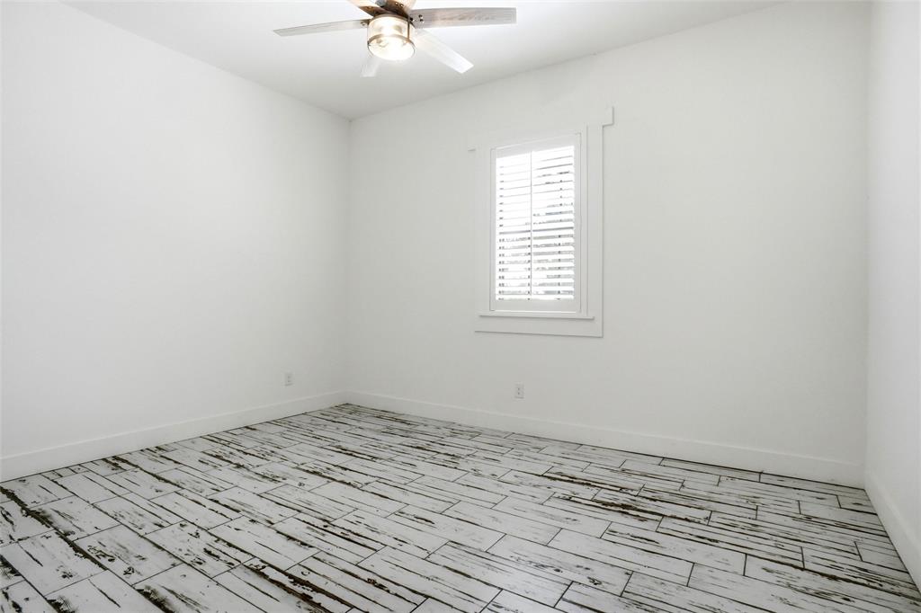 13240 Briar Road Azle, TX 76020 - Photo 21 of 39 an empty room with a window