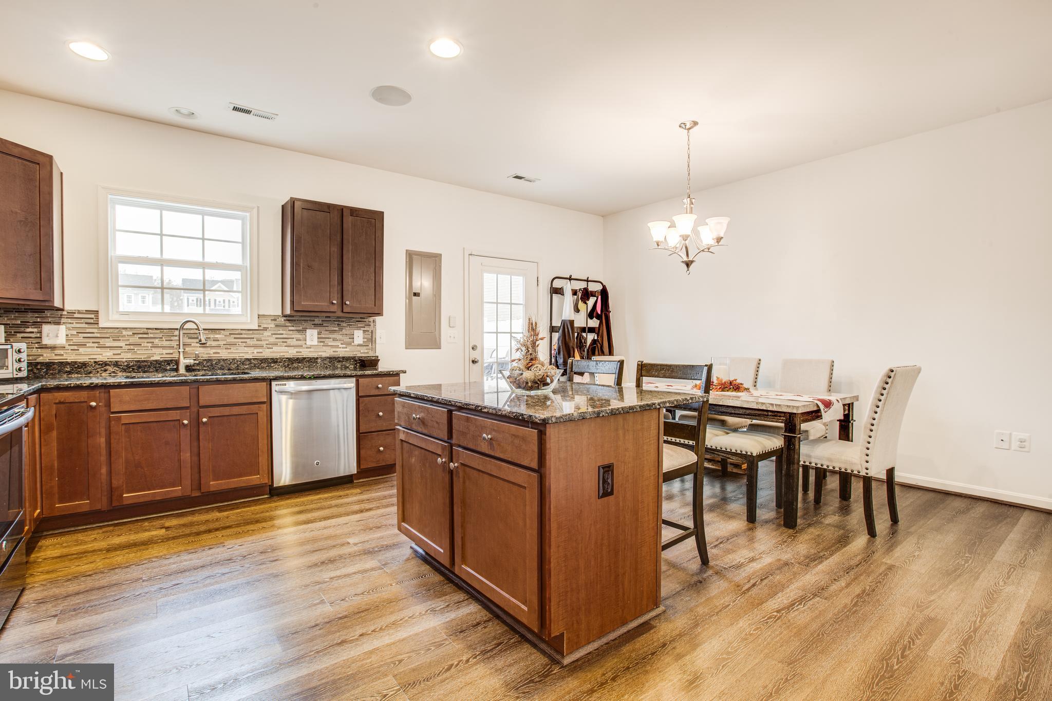 17276 Library Boulevard Ruther Glen, VA 22546 - Photo 9 of 34 nice size kitchen with island and granite counters