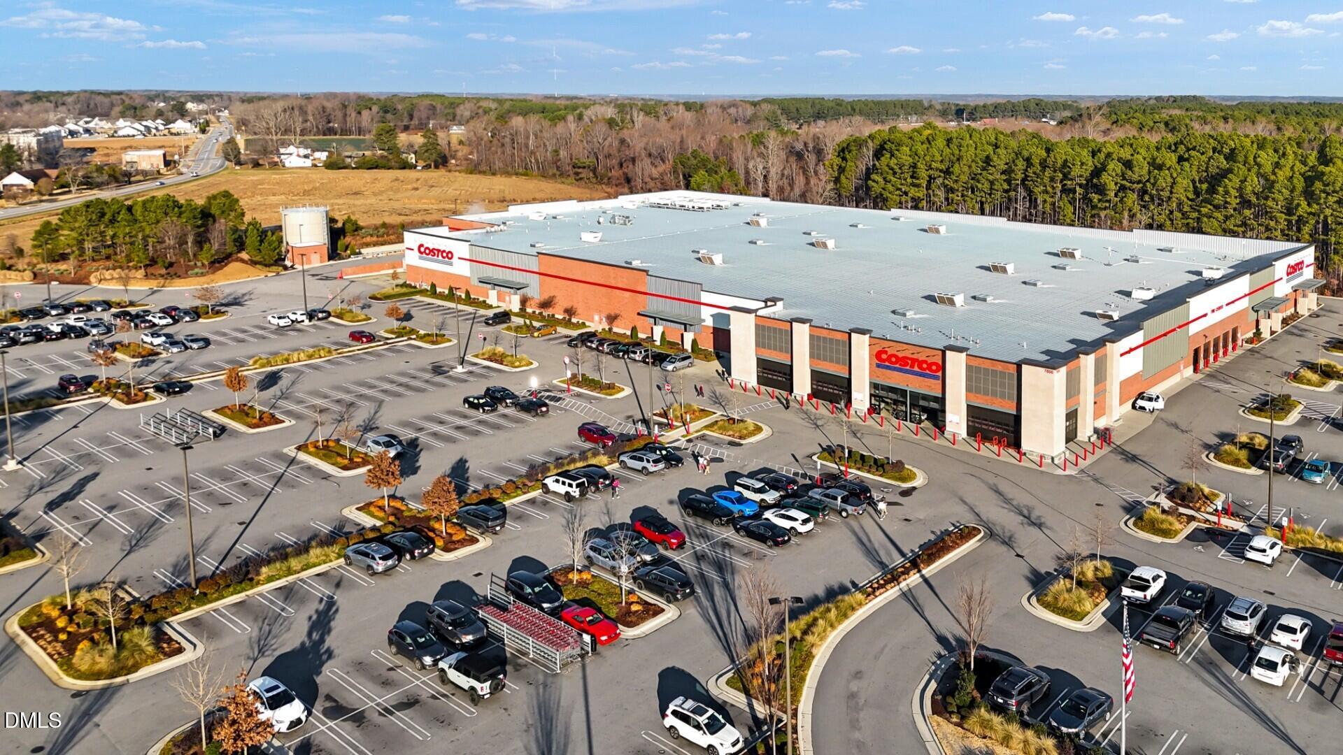 124 Fablewood Trail Garner, NC 27529 - Photo 21 of 27 an aerial view of a swimming pool and mountain