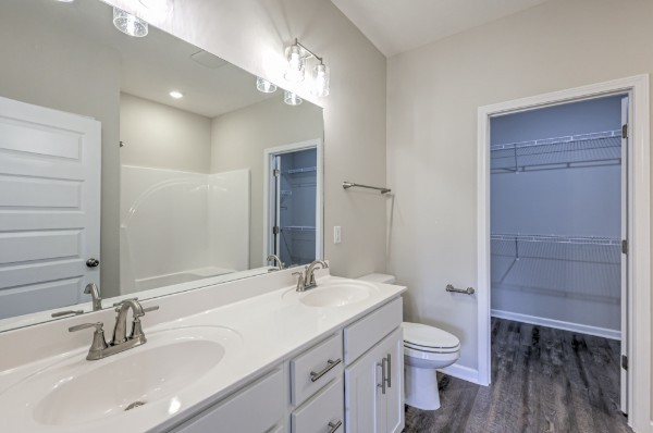 21 Bartow Street Decherd, TN 37324 - Photo 24 of 30 a bathroom with a sink a toilet and shower